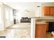 Stylish kitchen and open-concept living area combination with lots of natural light at 65 Heaton Place Trl, Covington, GA 30016
