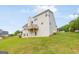 Two-story house with a deck and a spacious backyard for outdoor enjoyment at 447 W Wind Dr, Villa Rica, GA 30180