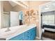 Bathroom boasts dual sinks, large mirror and opens into the bedroom at 447 W Wind Dr, Villa Rica, GA 30180