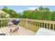 Outdoor deck with a grill, perfect for summer barbecues at 447 W Wind Dr, Villa Rica, GA 30180