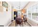 Cozy dining area featuring a chandelier and a large window with natural lighting at 447 W Wind Dr, Villa Rica, GA 30180
