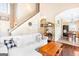 Inviting living room connects to the kitchen and features hardwood floors and a cozy atmosphere at 447 W Wind Dr, Villa Rica, GA 30180