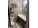 Bathroom with tile floors featuring a toilet and vanity with sink at 1685 Bailey Creek Sw Rd, Conyers, GA 30094