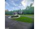 Beautiful home on a spacious lot featuring lush green lawns and a paved circular driveway at 1685 Bailey Creek Sw Rd, Conyers, GA 30094