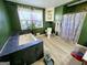 This bathroom features a soaking tub and modern fixtures, providing a functional and comfortable space for relaxation at 140 Whitehead Sw Rd, Oxford, GA 30054