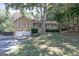 Charming two-story home featuring an inviting front porch, a well-maintained lawn, and a two-car garage at 304 N Briar Rdg, Woodstock, GA 30189