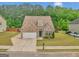 Charming two-story home with brick and stone accents and a two-car garage at 228 Madison Grace Ave, Mcdonough, GA 30252