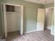 Bedroom featuring a closet and access to another room at 260 Pinehurst Dr, Stockbridge, GA 30281