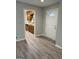 Entryway leading to the kitchen showcasing modern flooring and a bright white door at 260 Pinehurst Dr, Stockbridge, GA 30281