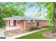 Brick home featuring a covered back porch perfect for outdoor entertaining at 3903 Rex Rd, Rex, GA 30273