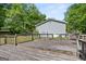 Backyard view of a large deck and fenced-in yard at 3580 Dorris Cir, Douglasville, GA 30135