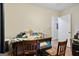 Bedroom with wood-look floors, off-white walls and a desk with two chairs at 3580 Dorris Cir, Douglasville, GA 30135