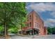 Street view of a brick building with a corner location and well-maintained sidewalk at 4173 Raphael St, Covington, GA 30014