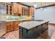 Well-appointed kitchen with a large island, custom cabinets, and modern appliances at 4173 Raphael St, Covington, GA 30014
