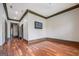 Large living room with hardwood floors, neutral walls, and ample space at 4173 Raphael St, Covington, GA 30014
