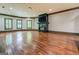 Bright living room featuring wood flooring, fireplace, and natural light at 4173 Raphael St, Covington, GA 30014