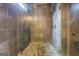 Tiled shower featuring glass door and dual shower heads, offering a luxurious bathing experience at 4173 Raphael St, Covington, GA 30014
