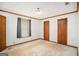 Simple bedroom with a closet and natural light awaits personalization at 3118 Rockbridge Rd, Avondale Estates, GA 30002