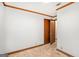 Simple bedroom with a closet and neutral walls awaits personalization at 3118 Rockbridge Rd, Avondale Estates, GA 30002