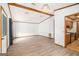 Spacious living room with new floors that flows into the kitchen area at 3118 Rockbridge Rd, Avondale Estates, GA 30002