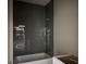 Modern bathroom showing gray subway tile in the shower area and white tub at 135 Church St, Palmetto, GA 30268