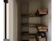 Spacious closet with custom wood shelving perfect for storage at 135 Church St, Palmetto, GA 30268