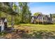 Backyard with a deck, shed, and plenty of green space at 231 Breckenridge Ln, Powder Springs, GA 30127