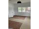 Bright bedroom featuring recessed lights, a large window, and light colored walls at 854 Clearwater Rd, Sharpsburg, GA 30277