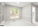 Bright dining area with large windows, providing ample natural light and charming views at 40 Kelsey Way, Palmetto, GA 30268