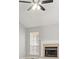 Close up of the fire place and windows in the living room at 40 Kelsey Way, Palmetto, GA 30268