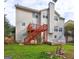 An image of the house's backyard with a deck at 976 Buckhorn Bnd, Locust Grove, GA 30248