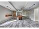 Spacious basement featuring a pool table, modern flooring, and ample lighting at 976 Buckhorn Bnd, Locust Grove, GA 30248