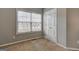 Cozy bedroom with a window, blinds, and a built-in closet at 976 Buckhorn Bnd, Locust Grove, GA 30248