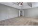 Bedroom featuring neutral carpet, neutral paint, and a view to the stairs at 976 Buckhorn Bnd, Locust Grove, GA 30248