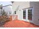 A view of the home's deck with a sliding glass door at 976 Buckhorn Bnd, Locust Grove, GA 30248