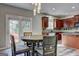 Dining room, kitchen and access to the outdoor deck at 976 Buckhorn Bnd, Locust Grove, GA 30248