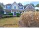 Traditional two-story house with manicured lawn and a brick facade at 976 Buckhorn Bnd, Locust Grove, GA 30248