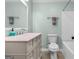 Bathroom featuring a decorative vanity and a shower/tub combo with tile flooring at 235 Castlegate Cir, Carrollton, GA 30116