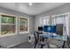 Home office with natural lighting, modern computer equipment, and bright gray walls at 235 Castlegate Cir, Carrollton, GA 30116