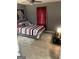 Cozy bedroom featuring a comfortable bed, plush rug, and contemporary decor at 1962 Markone Nw St, Atlanta, GA 30318