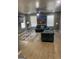 Spacious living room features two couches, an area rug, and a ceiling fan at 1962 Markone Nw St, Atlanta, GA 30318