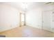 Bedroom featuring neutral carpet, window with curtains, and white walls at 260 Emerald Lake Dr, Fayetteville, GA 30215