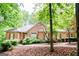 Beautiful single-story brick home with manicured landscaping and inviting front entrance at 260 Emerald Lake Dr, Fayetteville, GA 30215