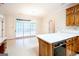 Eat-in kitchen features a breakfast nook with access to the deck at 260 Emerald Lake Dr, Fayetteville, GA 30215