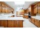 Traditional kitchen features custom oak cabinets and an oversized island at 260 Emerald Lake Dr, Fayetteville, GA 30215