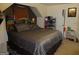 Cozy bedroom featuring a unique slanted ceiling and ample storage for shoes at 6974 Chilkat Sw Ct, South Fulton, GA 30331