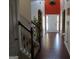 Grand two-story foyer with hardwood floors and decorative archways at 6974 Chilkat Sw Ct, South Fulton, GA 30331