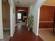 Inviting foyer showcasing archways, beautiful flooring, and a view into the living room at 6974 Chilkat Sw Ct, South Fulton, GA 30331