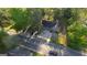 Aerial view of home with nice yard, driveway and street out front at 2228 Emory Sw St, Covington, GA 30014