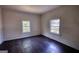 Empty bedroom with hardwood floors and natural light at 2228 Emory Sw St, Covington, GA 30014